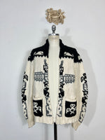 Cowichan-style sweater with tribal pattern and zip closure “XL”